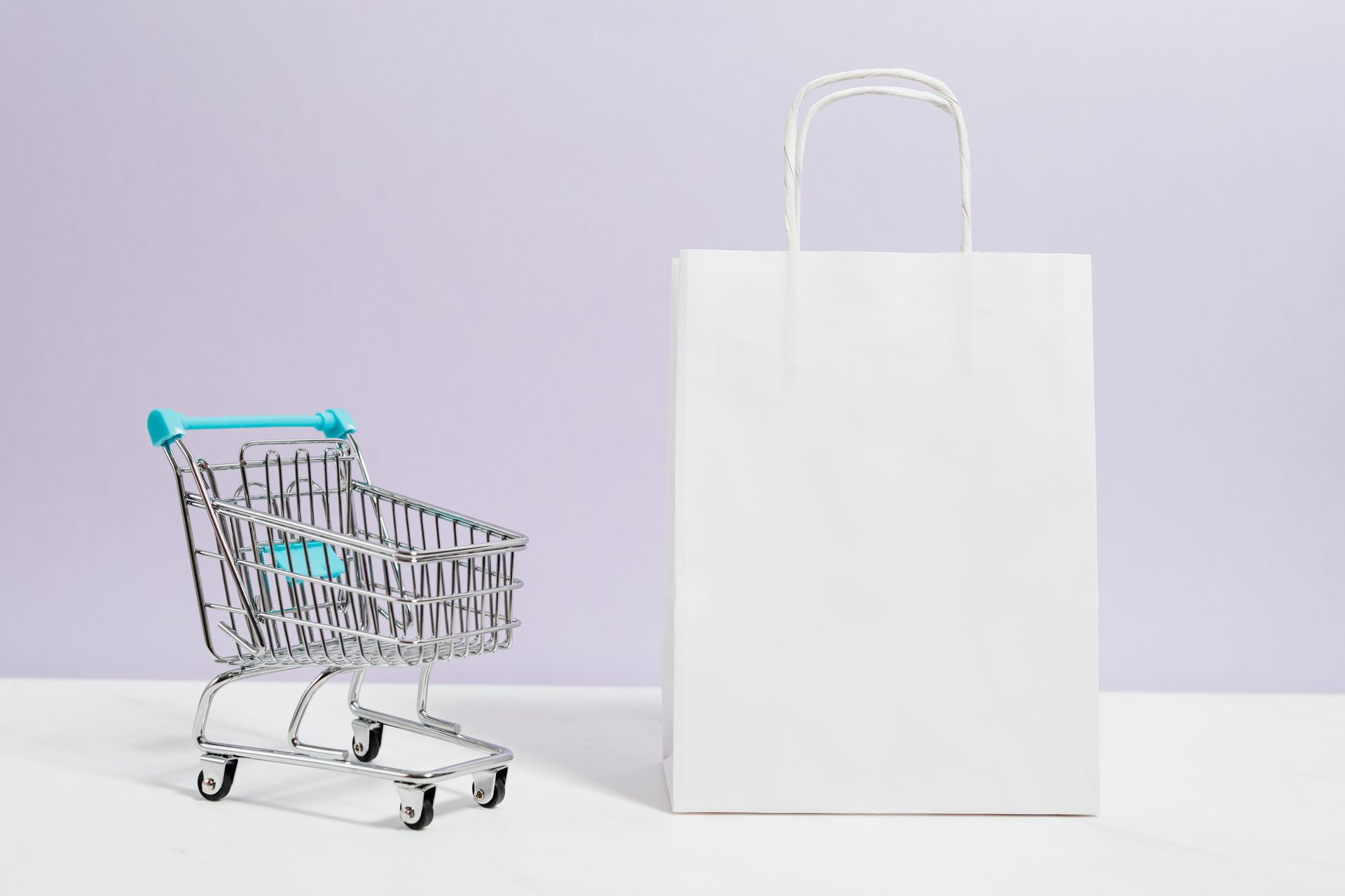 Online seller managing e-commerce orders on laptop